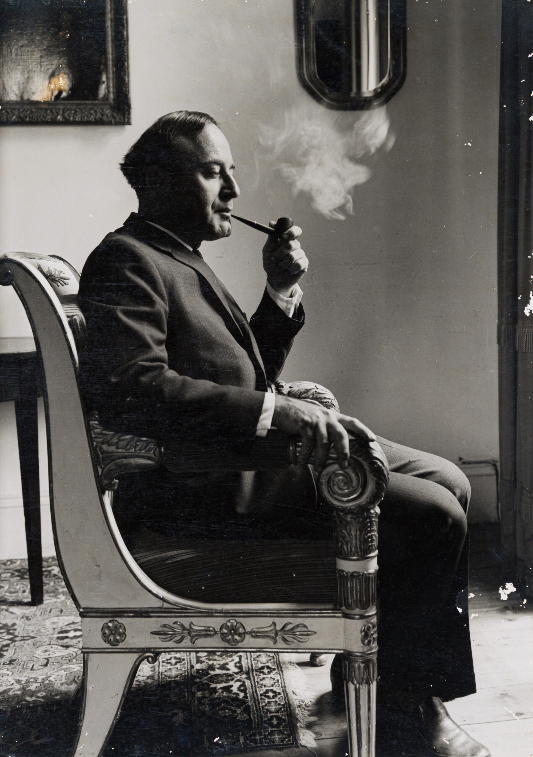 black and white photograph of Alexander Podlashuc smoking his pipe